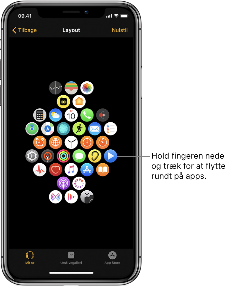 Layoutskærmen i appen Apple Watch, der viser et net af symboler. En billedtekst, hvor der står ”Tryk og hold nede, og træk for at flytte apps”, peger på et appsymbol.