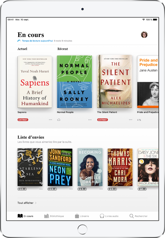 Un écran de l’app Livres. En bas de l’écran se trouvent, de gauche à droite, les onglets En cours, Bibliothèque, Librairie, Livres audio et Rechercher ; l’onglet « En cours » est sélectionné. En haut de l’écran se trouve la section « En cours », qui présente les livres en cours de lecture. En dessous se trouve la section « Liste d’envies », qui présente les livres que vous pourriez avoir envie de lire.