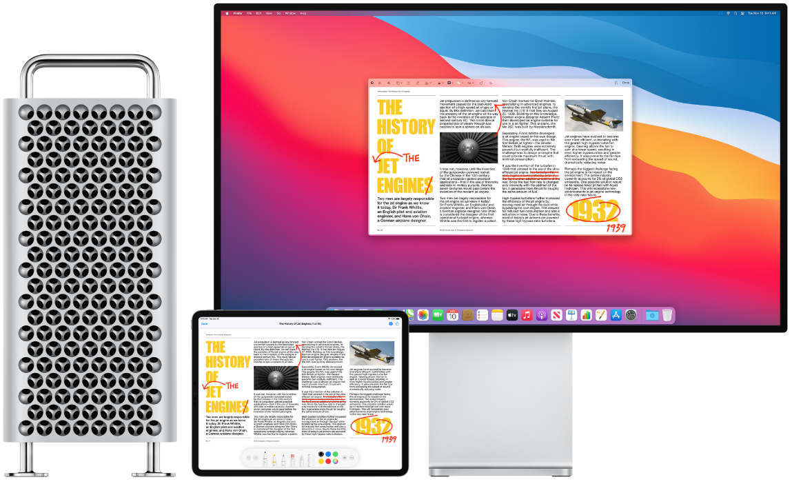 A Mac Pro and an iPad sit side by side. Both screens display an article covered in scribbled red edits, such as crossed out sentences, arrows, and added words. The iPad also has mark up controls at the bottom of the screen.