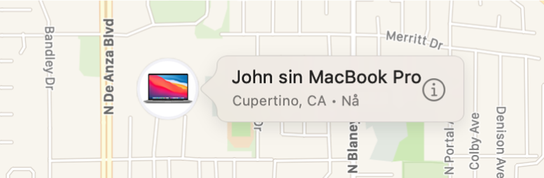 Et nærbilde av Informasjon-symbolet for Johns MacBook Pro.