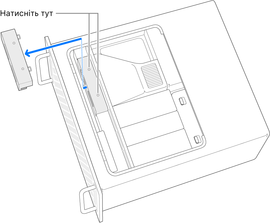 Mac Pro, покладений на бік, ілюстрація того, де натиснути, щоб зняти кришку SSD.