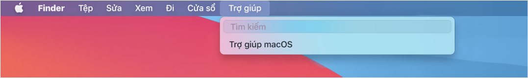 Một phần của màn hình nền với menu Trợ giúp được mở, đang hiển thị các tùy chọn menu cho Tìm kiếm và Trợ giúp macOS.