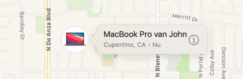 Een close-up van het infosymbool van Johns MacBook Pro.