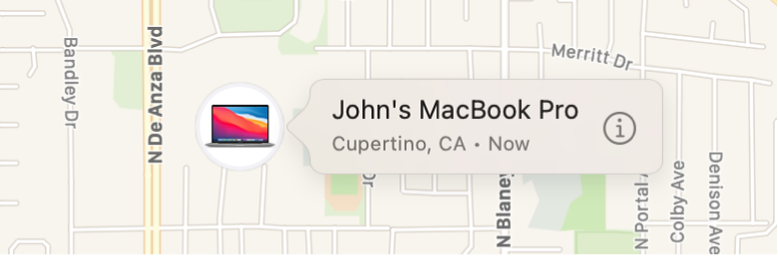 Bližnji prikaz ikone informacij za Johnov MacBook Pro.