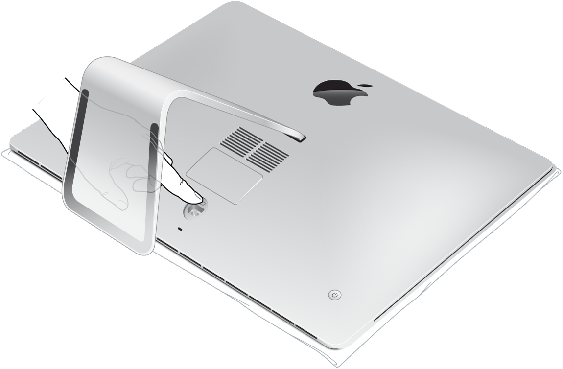 iMac đang nằm trên mặt phẳng với màn hình úp xuống, với một ngón tay đang nhấn vào nút cửa khoang bộ nhớ.