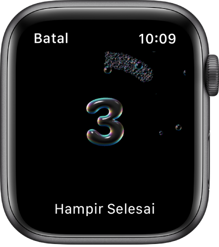 Pengira Mencuci Tangan, mengira detik daripada 3. Perkataan “Hampir Selesai” terletak di bahagian bawah skrin.