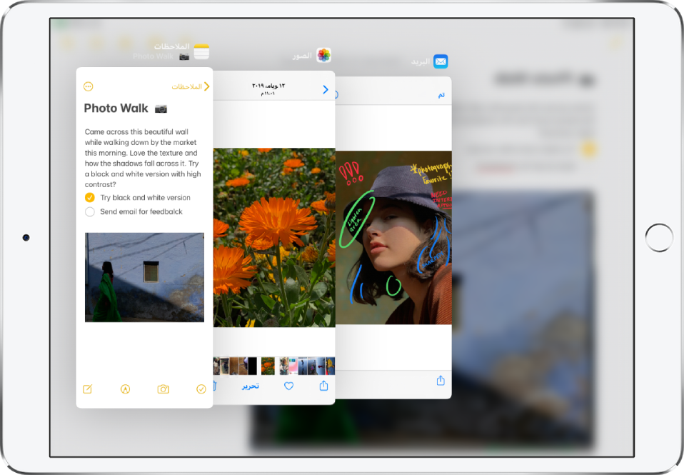 تفتح ثلاثة تطبيقات في نوافذ Slide Over.