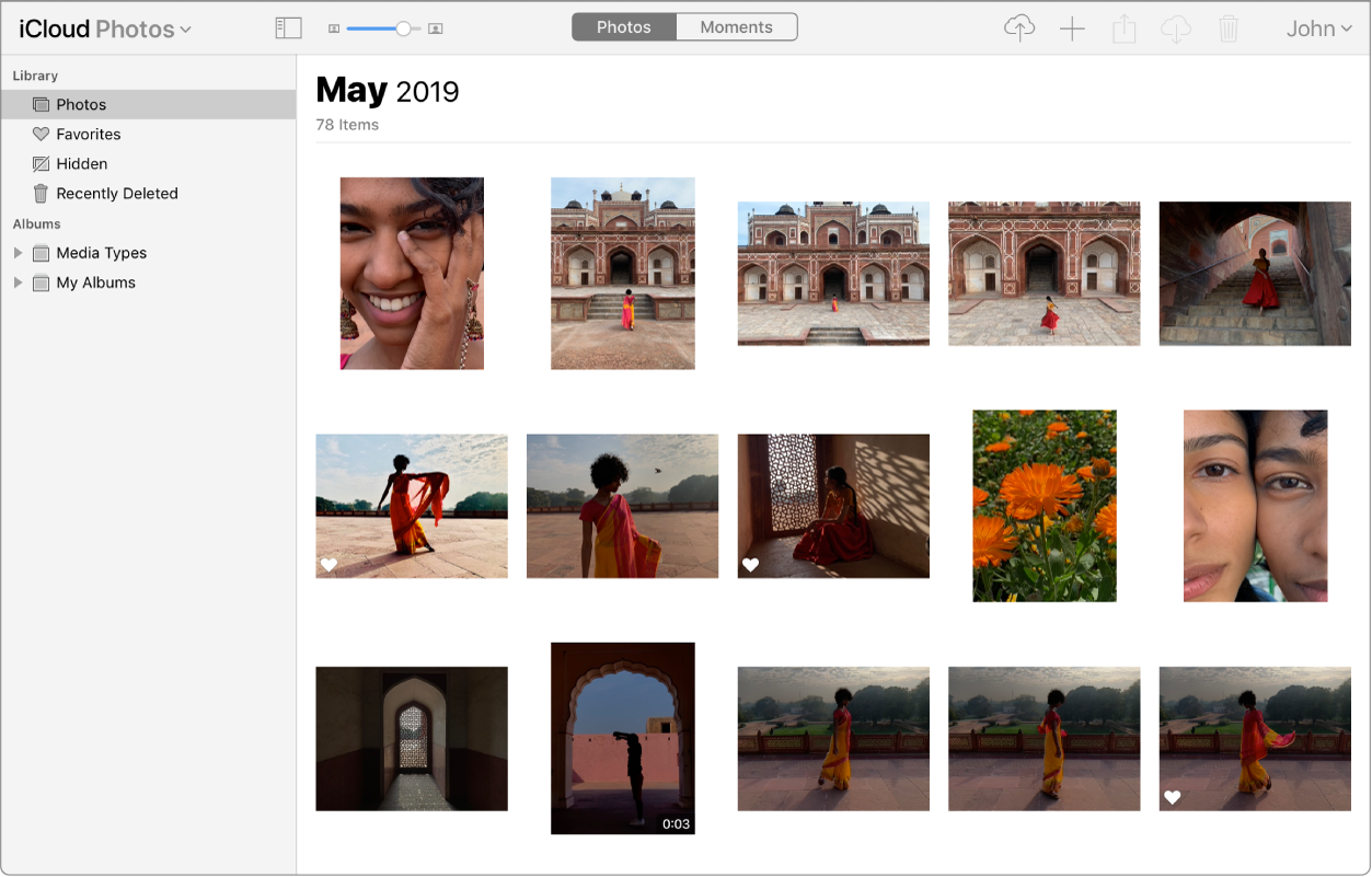 App Photos sur iCloud.com. Photos est sélectionné dans la barre latérale et des photos prises en mai 2019 sont visibles.