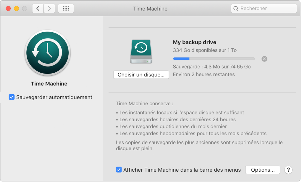 Préférences Time Machine affichant l’état d’avancement d’une sauvegarde sur un disque externe.