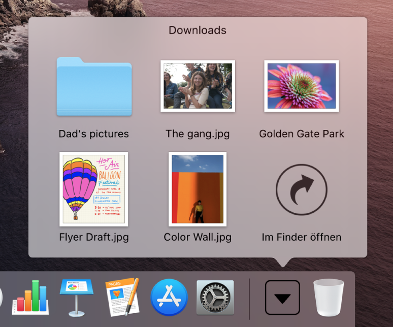 Der geöffnete Stapel „Downloads“ im Dock, dessen Inhalt in einem Gitter angezeigt wird.