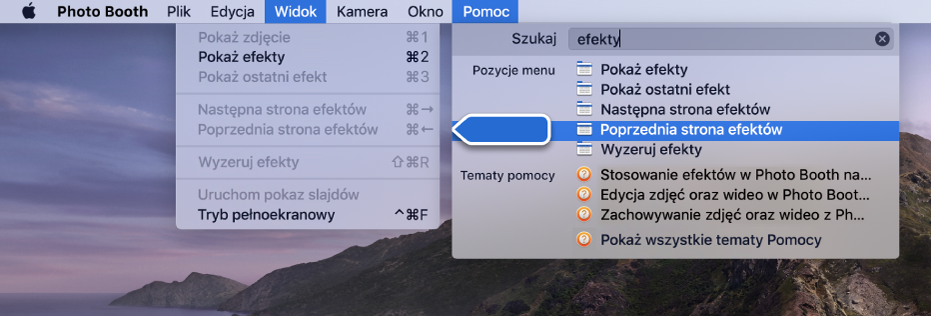 Menu pomocy Photo Booth z zaznaczonym wynikiem wyszukiwania polecenia menu oraz strzałką wskazującą to polecenie w menu aplikacji.