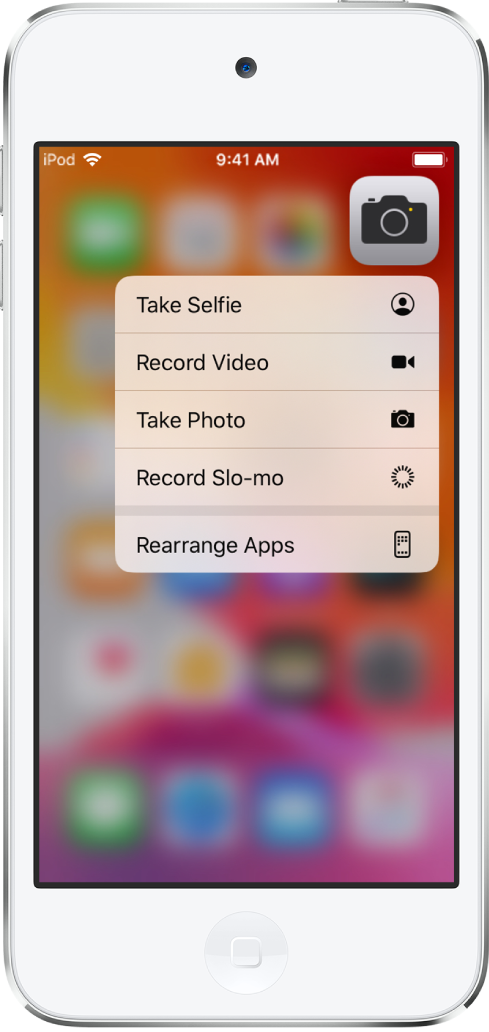 L’écran d’accueil flouté, avec le menu des actions rapides de l’appareil photo s’affichant sous l’app Appareil photo.
