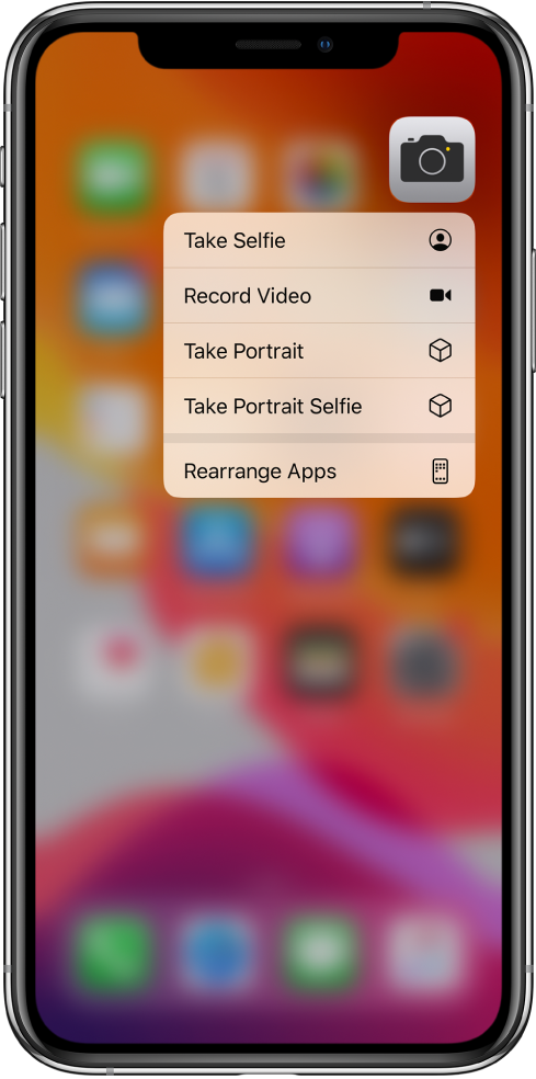 The Home screen blurred, with the Camera quick actions menu showing below the Camera app.