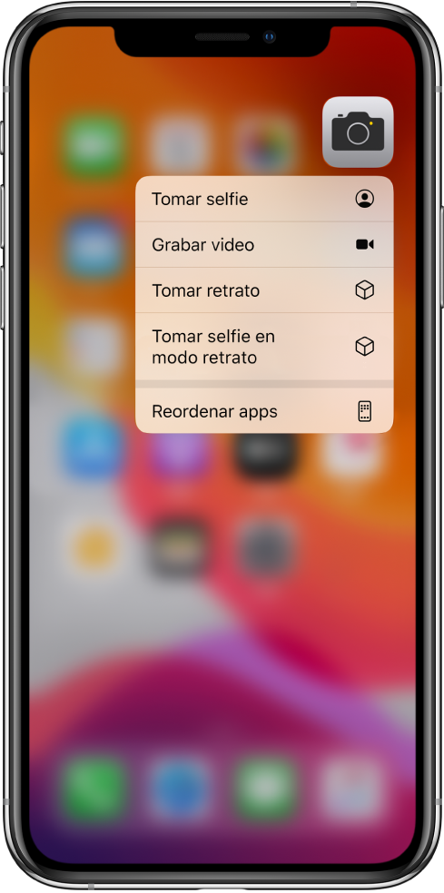 La pantalla de inicio difuminada, mostrando el menú de acciones rápidas de Cámara, debajo de la app Cámara.