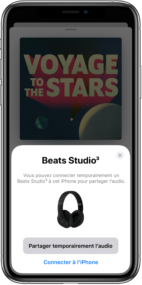 Un écran d’iPhone avec une image d’écouteurs Beats. vers le bas de l’écran se trouve un bouton permettant de partager temporairement du contenu audio.