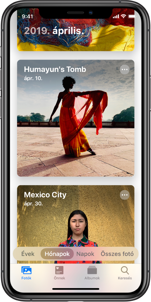 A Fotók alkalmazás képernyője. A Fotók lap és a havi nézet van kiválasztva. Két esemény látható 2019 áprilisából – Humájun császár síremléke és Mexikóváros.