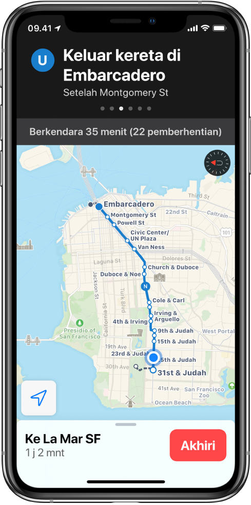 Peta rute transit di sepanjang San Francisco. Kartu rute di bagian atas layar menampilkan instruksi “Keluar dari kereta di Embarcadero”.