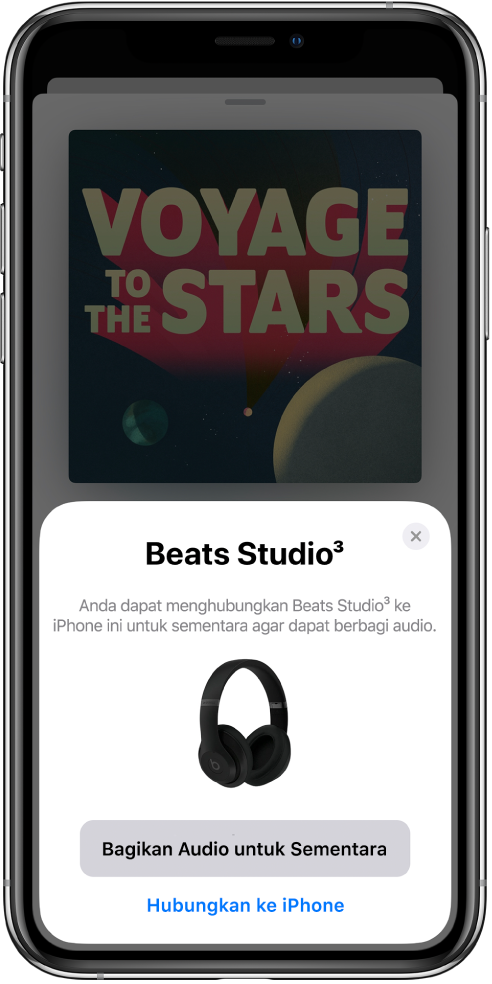 Layar iPhone dengan gambar headphone Beats. Di dekat bagian bawah layar terdapat tombol untuk berbagi audio untuk sementara.