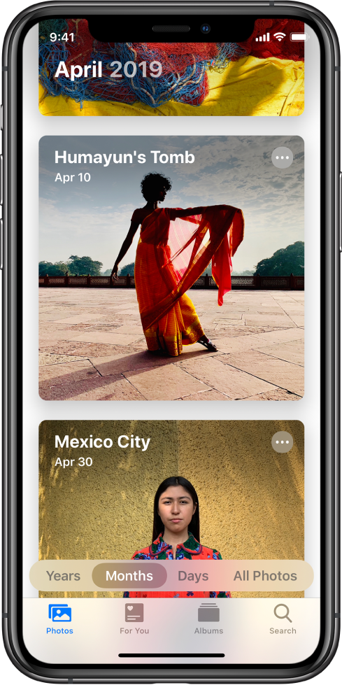 Photos қолданбасындағы экран. Photos қойындысы мен Months көрінісі таңдалған. 2019 жылдың сәуір айынан екі шара Humayun’s Tomb және Mexico City көрсетілген.