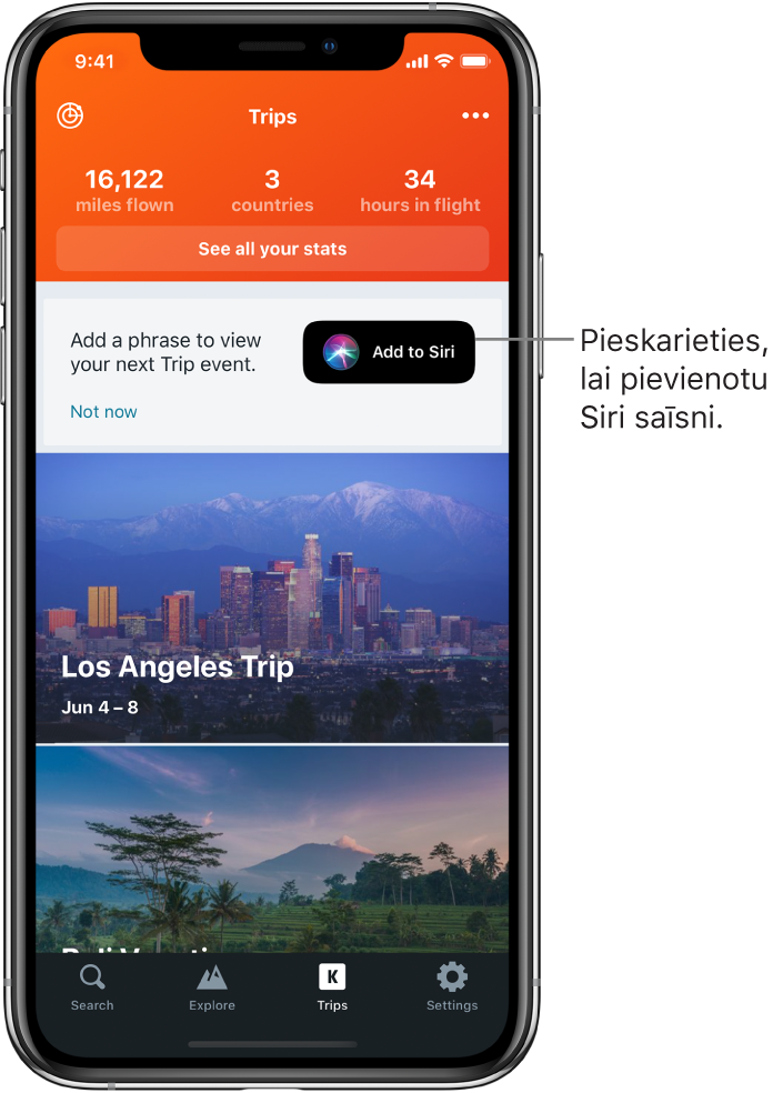 Ceļojumu lietotnes ekrāns. Pa labi no teksta “Add a phrase to view your next trip event” ir poga “Add to Siri”.