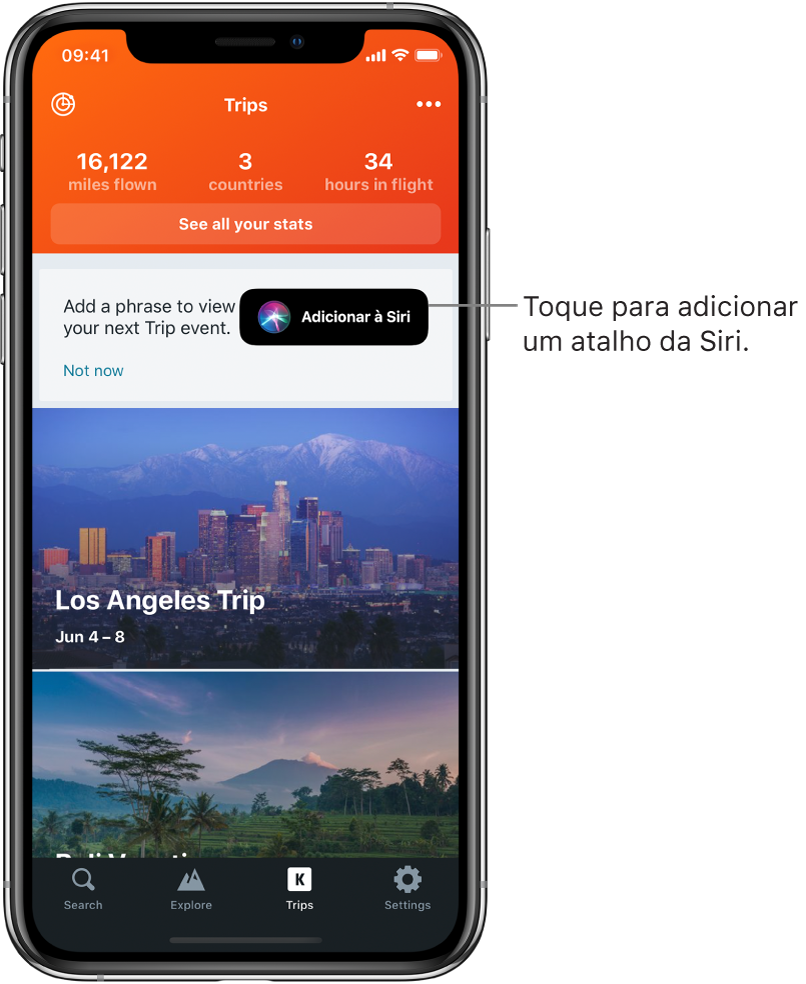 A tela de um app de viagem. O botão “Adicionar à Siri” à direita do texto dizendo “Adicione uma frase para ver sua próxima viagem”.