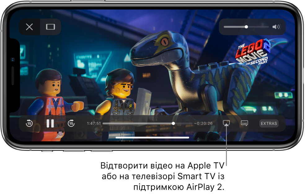 На екрані iPhone відтворюється фільм. Унизу екрана розташовані елементи керування відтворенням, зокрема кнопка «Відеодублювання» внизу справа.