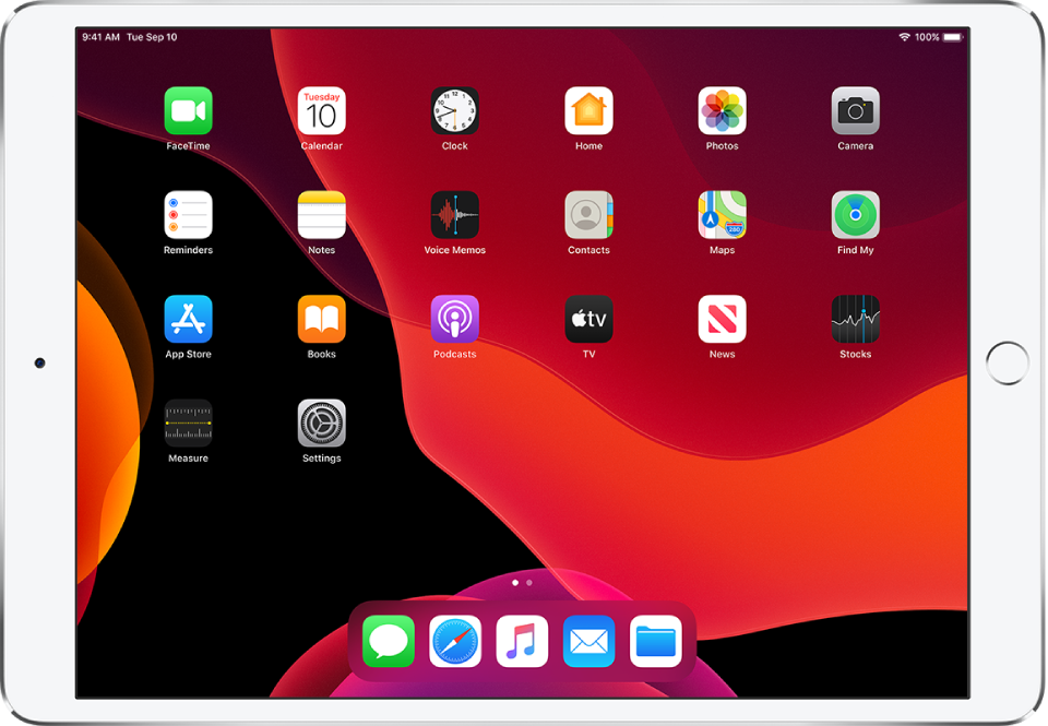 The iPad Home screen in Dark Mode.