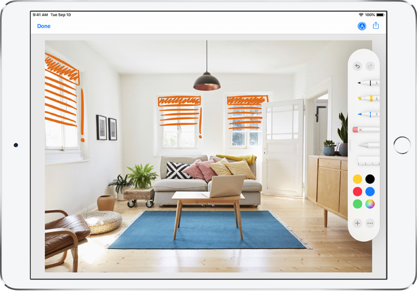 A photo is marked up with orange lines to indicate window blinds over windows. Drawing tools and color selections appear on the right of the screen.