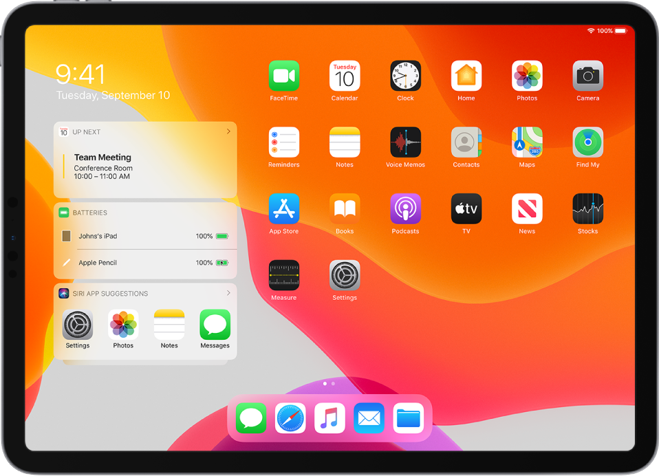 The iPad Home screen in landscape orientation. On the left side of the screen, from top to bottom, are the Calendar, Batteries, and Siri App Suggestions widgets. The Batteries widget shows the iPad and Apple Pencil battery at 100%.