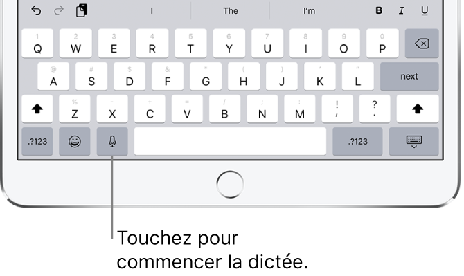 Clavier à l’écran montrant la touche Dicter (à gauche de la barre d’espace), que vous pouvez toucher pour commencer à dicter du texte.