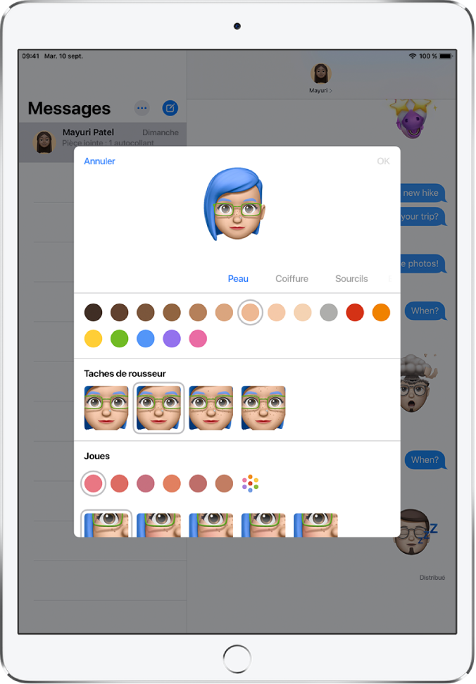 L’écran de création d’un Memoji, montrant un personnage en cours de création en haut, les caractéristiques physiques sous le personnage et les options de personnalisation pour la caractéristique sélectionnée en dessous. Le bouton OK se trouve en haut à droite et le bouton Annuler est en haut à gauche.