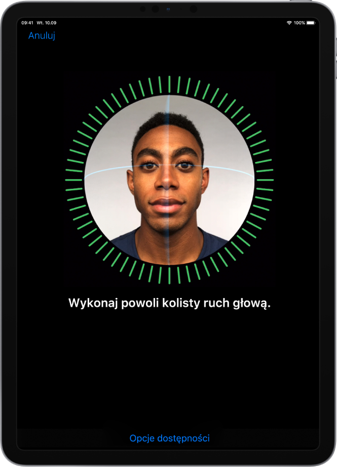 Ekran konfiguracji funkcji Face ID. Na ekranie wyświetlana jest twarz otoczona okrągłą ramką. Poniżej znajduje się tekst proszący użytkownika o powolne wykonanie kolistego ruchu głową.