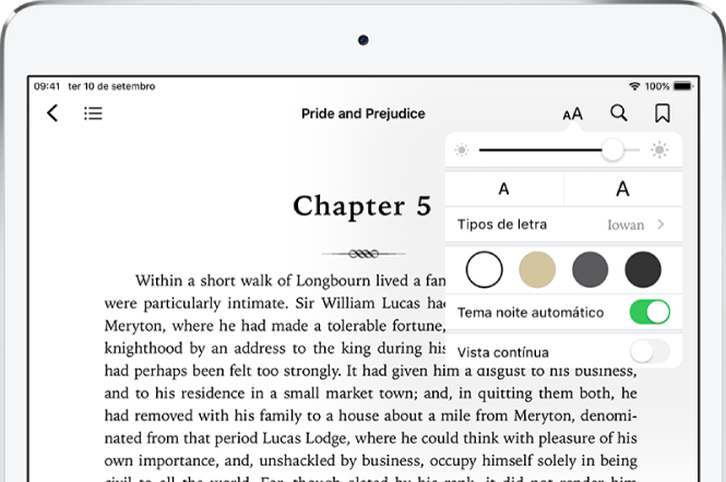 O menu de apresentação de um livro está selecionado e mostra os controlos (de cima para baixo) de brilho, tamanho e estilo da letra, cor de página, tema noite automático e vista contínua.