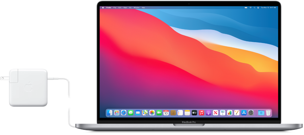MacBook Pro със свързан захранващ адаптер.