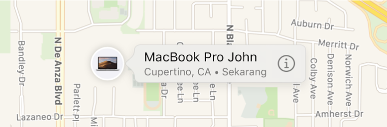 Ikon Info untuk MacBook Pro John dari dekat.