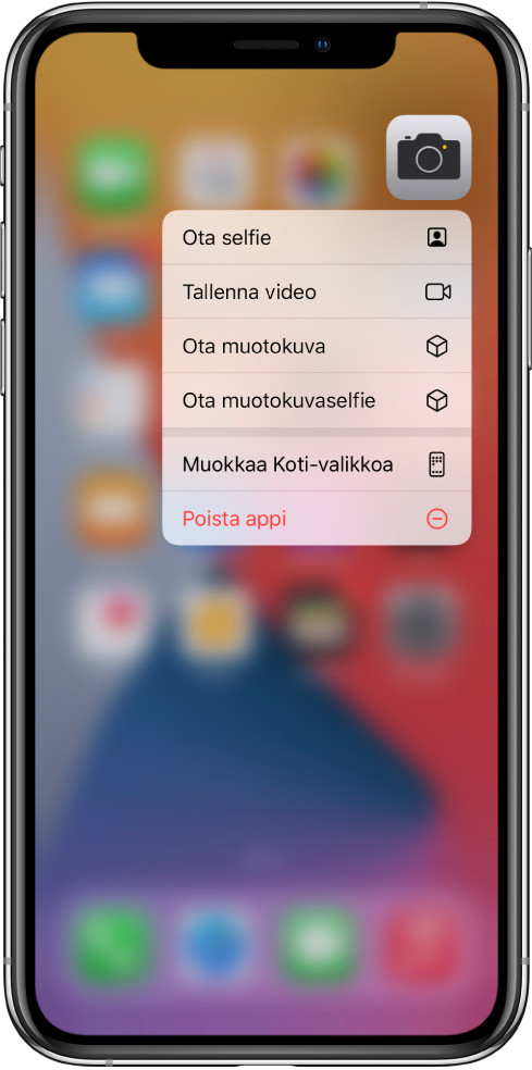 Koti-valikko sumennettuna. Kamera-apin alla näkyy kameran pikatoimintovalikko.
