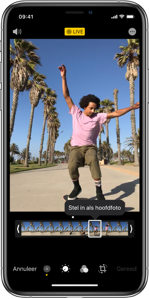 Een Live Photo-scherm met in het midden de Live Photo. De knop 'Live' staat boven in het midden en de knop 'Geluid' staat linksbovenin. Onder de Live Photo staat de frameviewer, waarbij de knop 'Stel in als hoofdfoto' actief is. Aan beide zijden van de frameviewer staan twee balken waarmee je de Live Photo kunt inkorten.