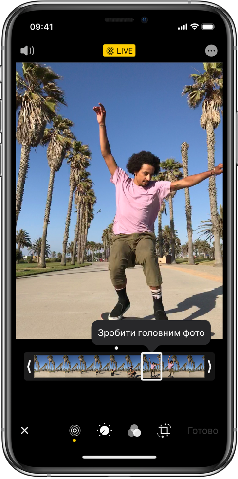 Екран Live Photo з Live Photo в центрі. Зверху посередині — кнопка Live, а зверху зліва — кнопка «Звук». Під Live Photo знаходиться переглядач кадрів з активною кнопкою «Зробити головним фото». На кінцях переглядача кадрів розташовані дві смуги, за допомогою яких можна обрізати Live Photo.