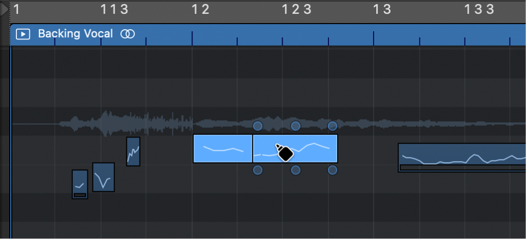 Ilustración. Se están combinando dos notas con la herramienta Pegamento en el editor de pistas de audio.