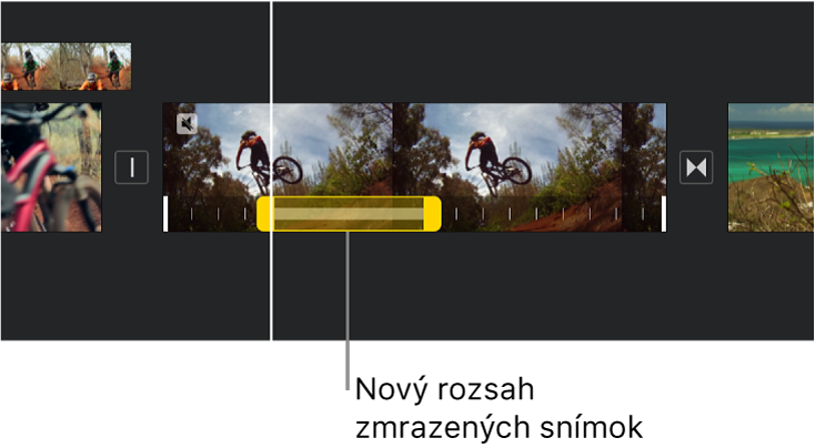 Zastavený záber so žltými úchytmi rozsahu zobrazený v dolnej časti videoklipu na časovej osi s počiatkom zastaveného záberu na pozícii bodu prehrávania.