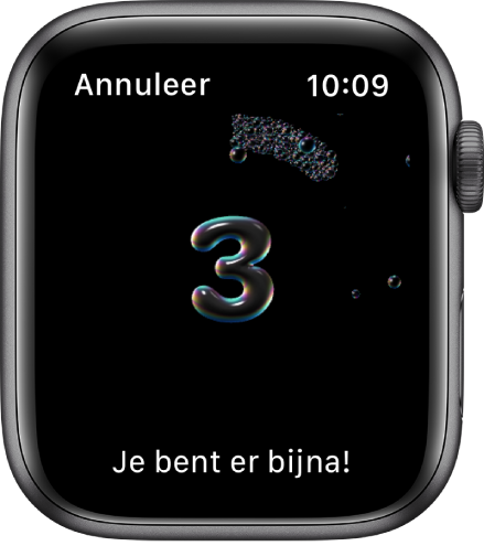 Het scherm 'Handen wassen', met een timer die vanaf 3 terugtelt. Onderin staat de tekst "Je bent er bijna!"