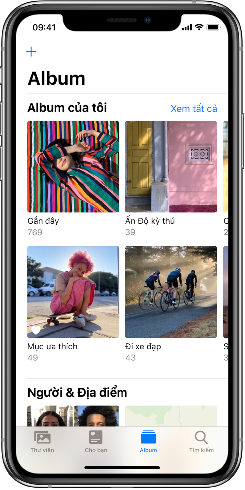 Tab Album nằm ở cuối màn hình được chọn. Bên dưới đề mục Album của tôi, màn hình có các album Gần đây, Ấn Độ kỳ thú, Mục ưa thích và Đi xe đạp. Bên cạnh đề mục Album của tôi là nút Xem tất cả. Ở góc trên cùng bên trái của màn hình là nút thêm.