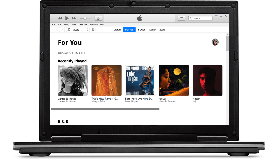 A PC and an iPhone with Apple Music For You.