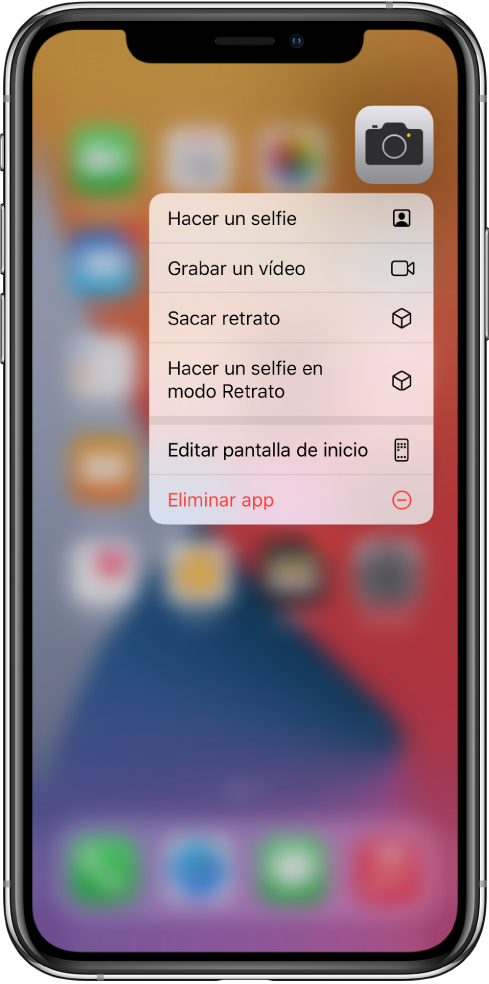 Pantalla de inicio borrosa con el menú de acciones rápidas de la app Cámara debajo de la app.