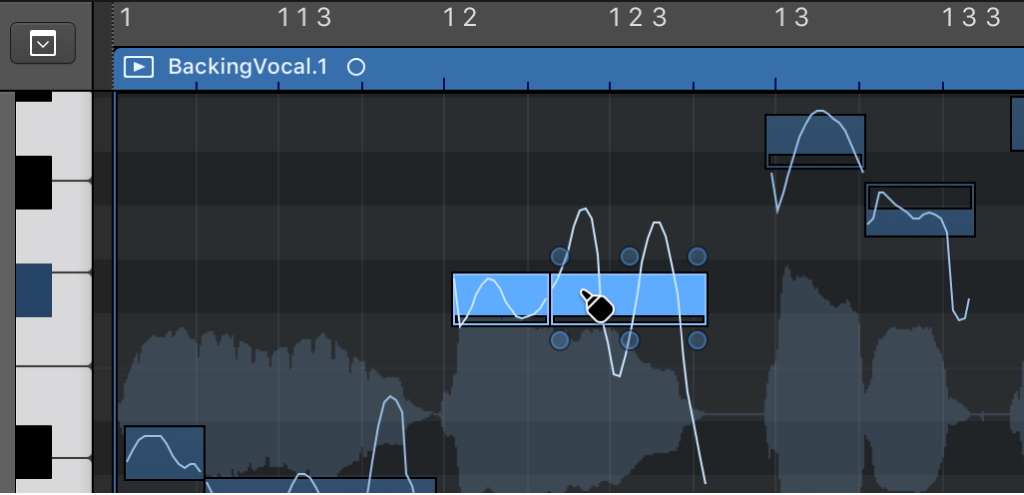 Ilustración. Se están combinando dos notas con la herramienta Pegamento en el editor de pistas de audio.