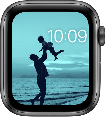 The Photos watch face shows a photo from your synced photo album. The time in near the top right.