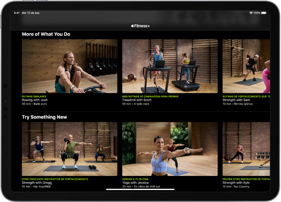 Un iPad mostrando entrenamientos de Fitness+ en las categorías “More of What You Do” y “Try Something New”.