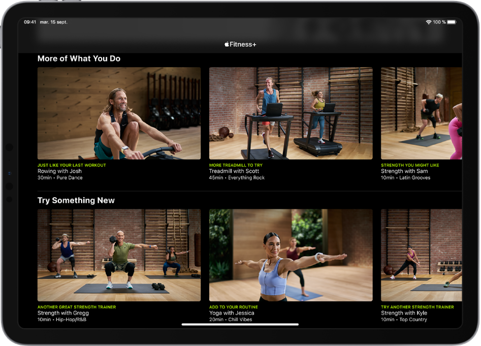 Un iPad prezentând exerciții Fitness+ în categoriile “More of What You Do” și “Try Something New”.