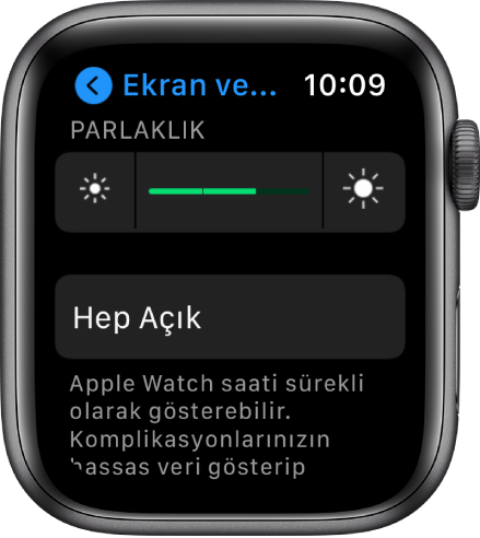 En üstte Parlaklık sürgüsü ve altta Hep Açık düğmesi olmak üzere Apple Watch’ta Parlaklık ayarları.