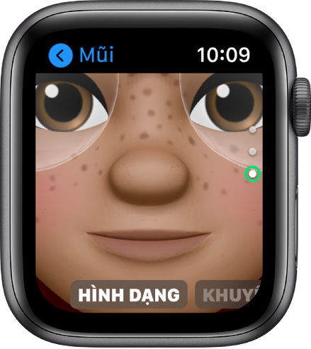 Ứng dụng Memoji trên Apple Watch đang hiển thị màn hình sửa Mũi. Một hình ảnh cận cảnh của khuôn mặt, với mũi ở giữa. Từ Hình dạng xuất hiện ở dưới cùng.